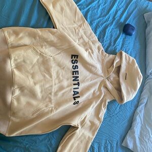 Brand new essentials hoodie color ivory size small